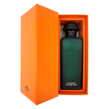 Hermes Concentre D'Orange Verte Eau De Toilette 100ml bottle, featuring a sleek green glass design with a black cap, representing a fresh citrus fragrance for men and women, available at Zakura Global.